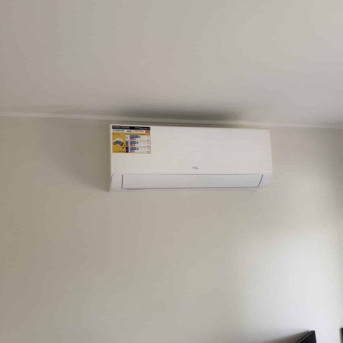 An aircon unit on a wall.
